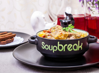 Pork stew served with cooked potatoes