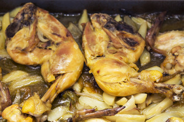 pieces of roasted chicken, wings and thighs