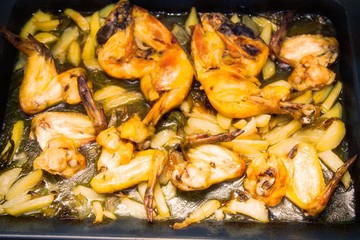 pieces of roasted chicken, wings and thighs