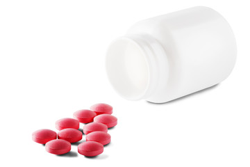 Medical pink pills and white bottle on white isolated background. Concept of healthcare and medicine.