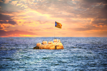 Flag of Catalonia on a lonely island