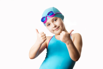 Fototapeta na wymiar Little caucasian 7 years old swimmer