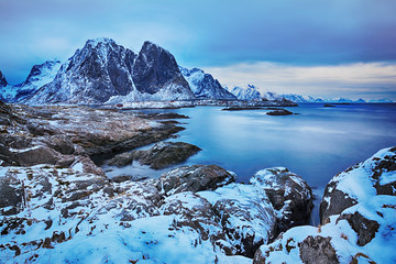 Blue hour. Beautiful winter landscape of picturesque mountains of Lofoten islands