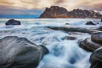 Beautiful Norway landscape of picturesque arctic beach of cold Norwegian Sea
