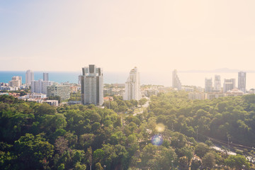 Thailand aerial high view point from Pattaya Unixx condo: park, ocean beach and condominiums. Relax background for meditations. Downtown with blue clear sky. Sunny day