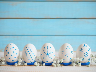 Easter eggs on blue background