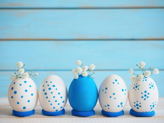 Obraz premium Easter eggs on blue background