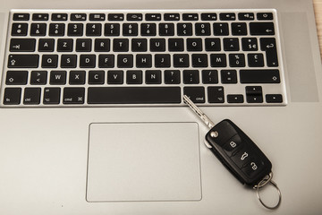 car key on the computer keyboard