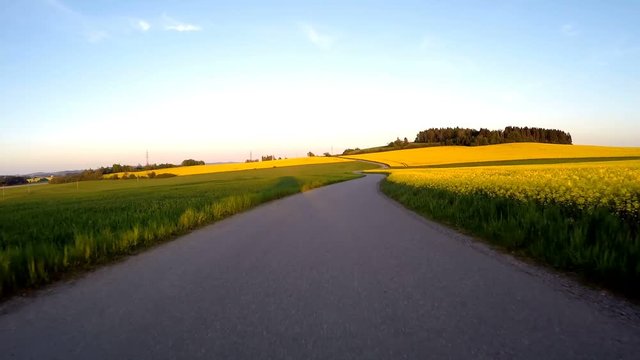 Car driving in spring countryside