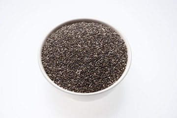 Chia seeds isolated with white background. Healthy superfood.