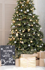 Many boxes with a christas gifts near the tree