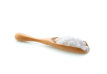 Fototapeta na wymiar salt in wood scoop on white background