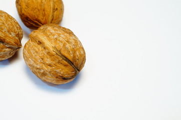 Walnuts close-up on white background