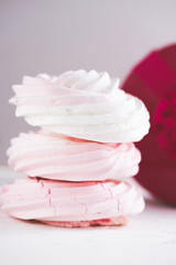 aspberry meringue on concrete desk. Space for text. Close up view. Romatic wedding.