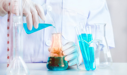 Oil pouring, Formulating the chemical for medicine,Laboratory research, dropping liquid to test tube