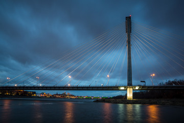 Swietokrzyski bridge over the Vistula river at night  in Warsaw, Poland