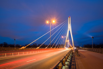 Fototapeta na wymiar Swietokrzyski bridge over the Vistula river in Warsaw, Poland
