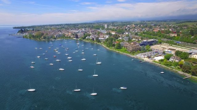 4K Switzerland cinematic aerial shot. Flying over Lake Geneva area