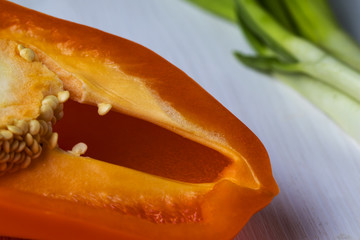 sliced vegetables while cooking salad in the kitchen