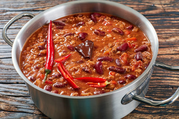 chili con carne with whole red chilis