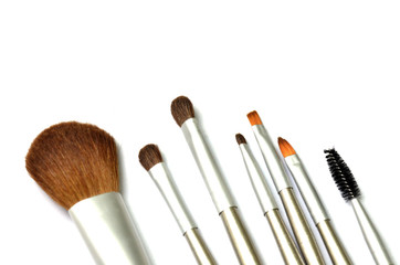 Multi-colored brushes with white background image.