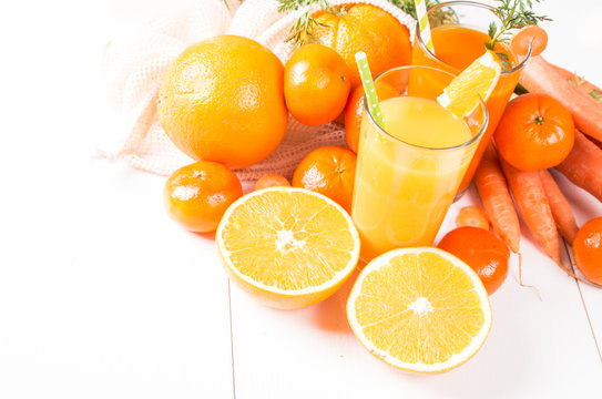 Fresh juice, Orange and carrot drink on white background. Fruits and vegetable. 