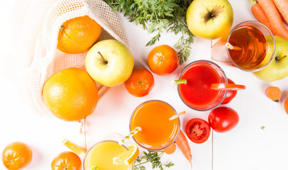 Juice mix drink. Tomato, Orange, Apple and Carrot smoothie drink on white background with fresh fruits and  vegetable. 