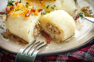 Potato dumplings stuffed with minced meat.