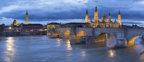 Zaragoza - The cityscape from cathedral Basilica del Pilar tower with the Puente de Piedra bridge,