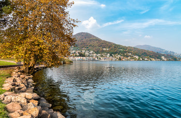 Autumn landscape of Lavena Ponte Tresa located on the western shore of lake Lugano, Italy
