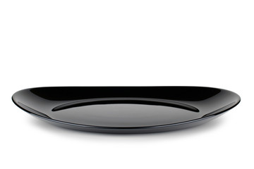 Black empty plate isolated on white background.