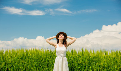 girl in dress at wheat field
