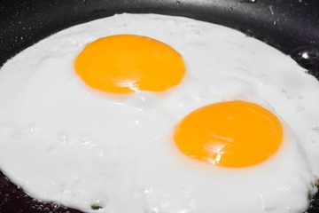two sunny side up eggs