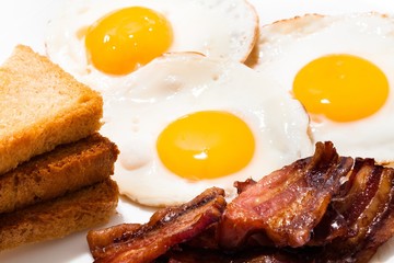 Breakfast meal - eggs, toast and bacon