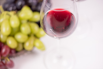 Red, blue and white grapes on the table. View with copy space