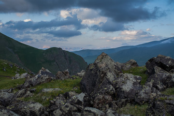 background of volcanic stones and rain clouds