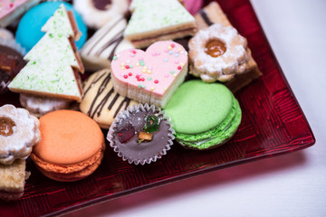 Traditional celebration festive homemade decorated sweets on wooden background