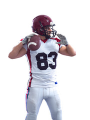 american football player throwing ball