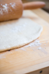 Preparation steps for homemade baked poppy rolled cake - rolled dough and flour