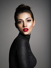 Beautiful young fashion woman with red lipstick.