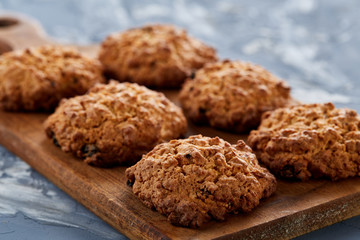 Top view close-up picture of tasty cookies on the cutting board, shallow depth of field, selective focus