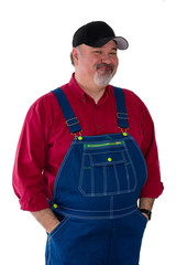 Smiling man wearing dungarees on white background