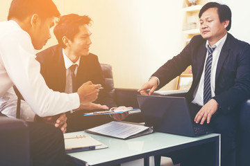 business partners signing contract about  invest in global market ; business partners review and analyze information report of economic investment at office.