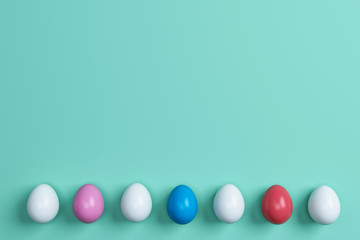 colorful easter eggs on green background.Space for text