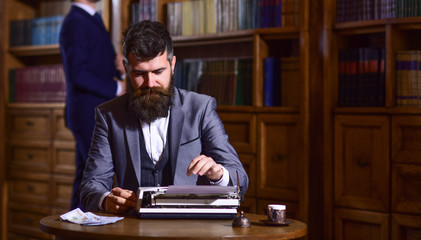 Writing and literature concept. Man with beard and busy face