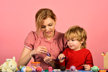 Naklejka premium Easter and happy moments concept. Woman and little boy