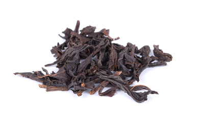 Black tea dried leaves isolated on white background