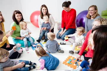 Young moms with their kids