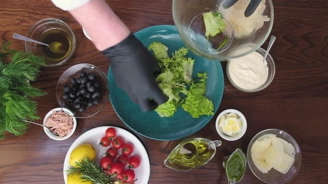Preparation of salad from the top view. The concept of healthy and delicious food
