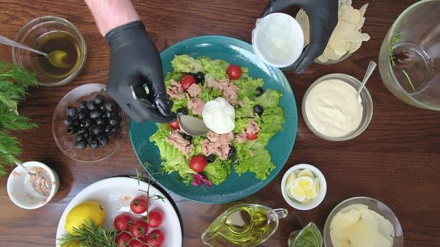 Preparation of salad from the top view. The concept of healthy and delicious food
